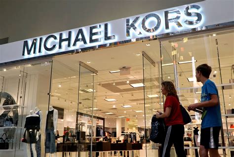 michael kors shares hit record high|Michael Kors lifts full.